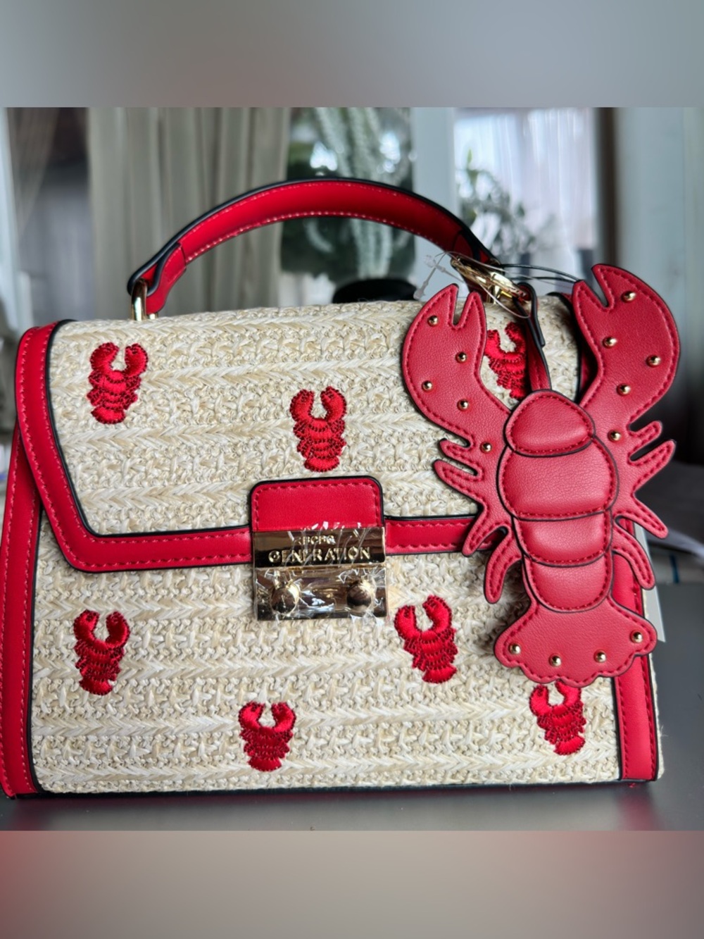 Red Lobster Embroidered Straw Top-Handle Bag w/ charm by BCBG Generation. NWT